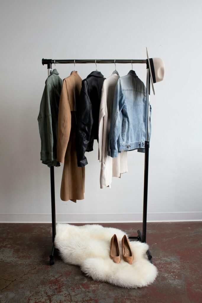 Curated garments displayed on a clothing rack in a fashion showroom